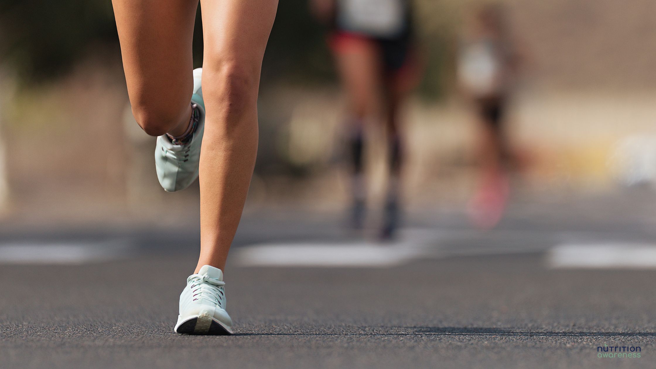 Cropped image of a runner's feet during a race